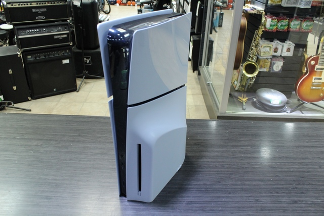 Console PS5 slim 1to + lecteur cd + chargeur a manette + acc - Image 2